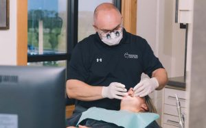 Higson Dental, best dentist Grande Prairie Alberta - qualified Dentist and Patient having dental exam