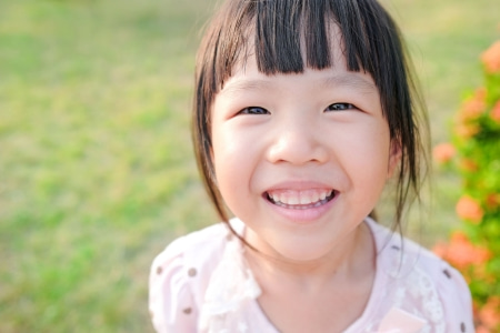 kid smiling pediatric dentist in Grande Prairie, AB