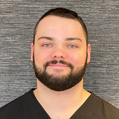 Dr. Schael Higson